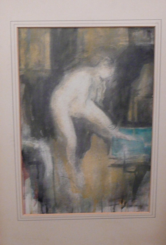C 34 Nude standing in an interior